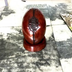 CARVED WOODEN RUGBY BALL
